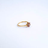 Vintage 9 karaat flower ring met robijnen en diamant